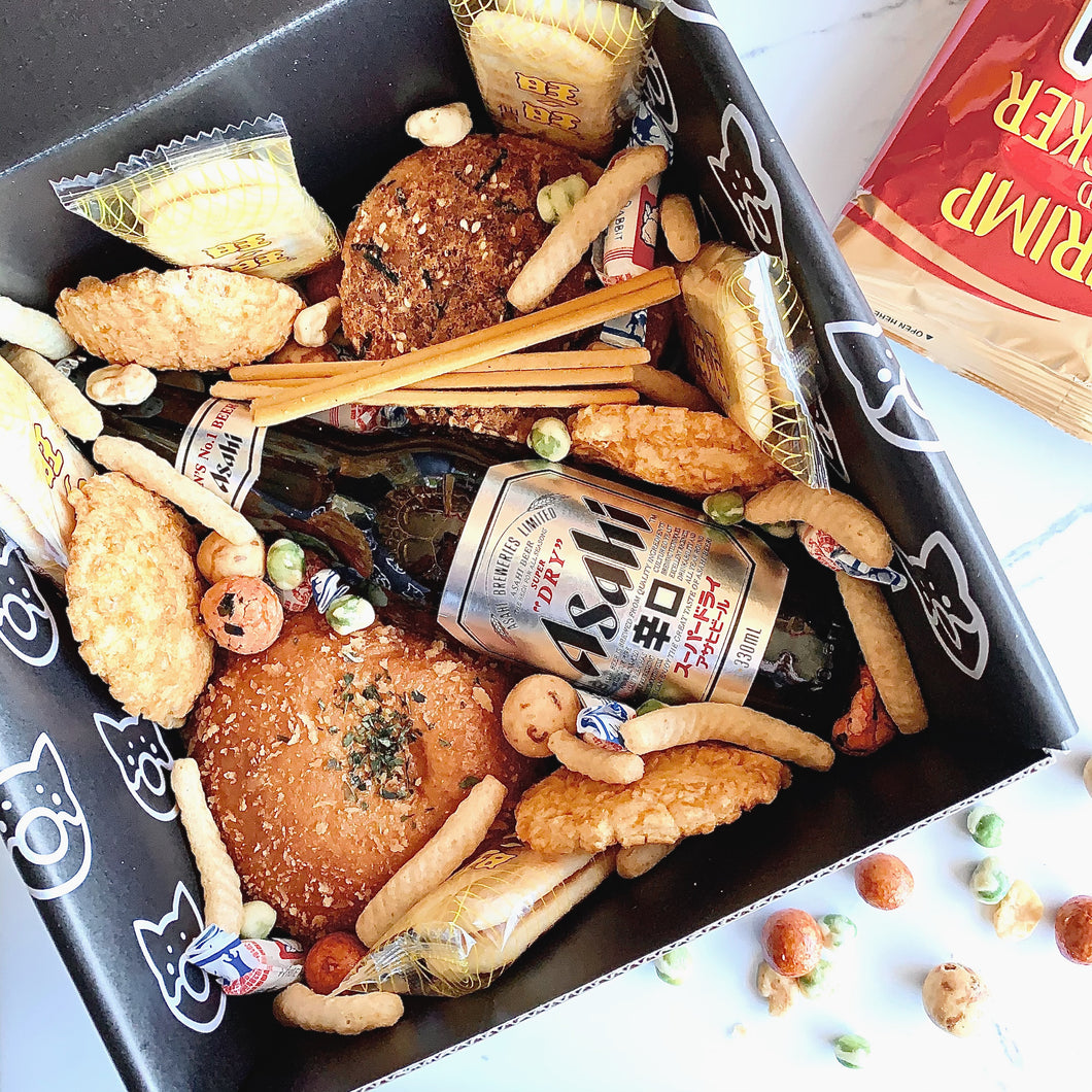 Buy Asian snack box online. Gifts for him. Asian snacks. Featuring Asahi beer & white rabbit candy. Pretz sticks, shrimp chips & rice crackers included.